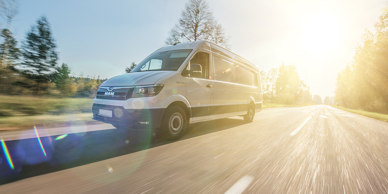 Van driving on a highway